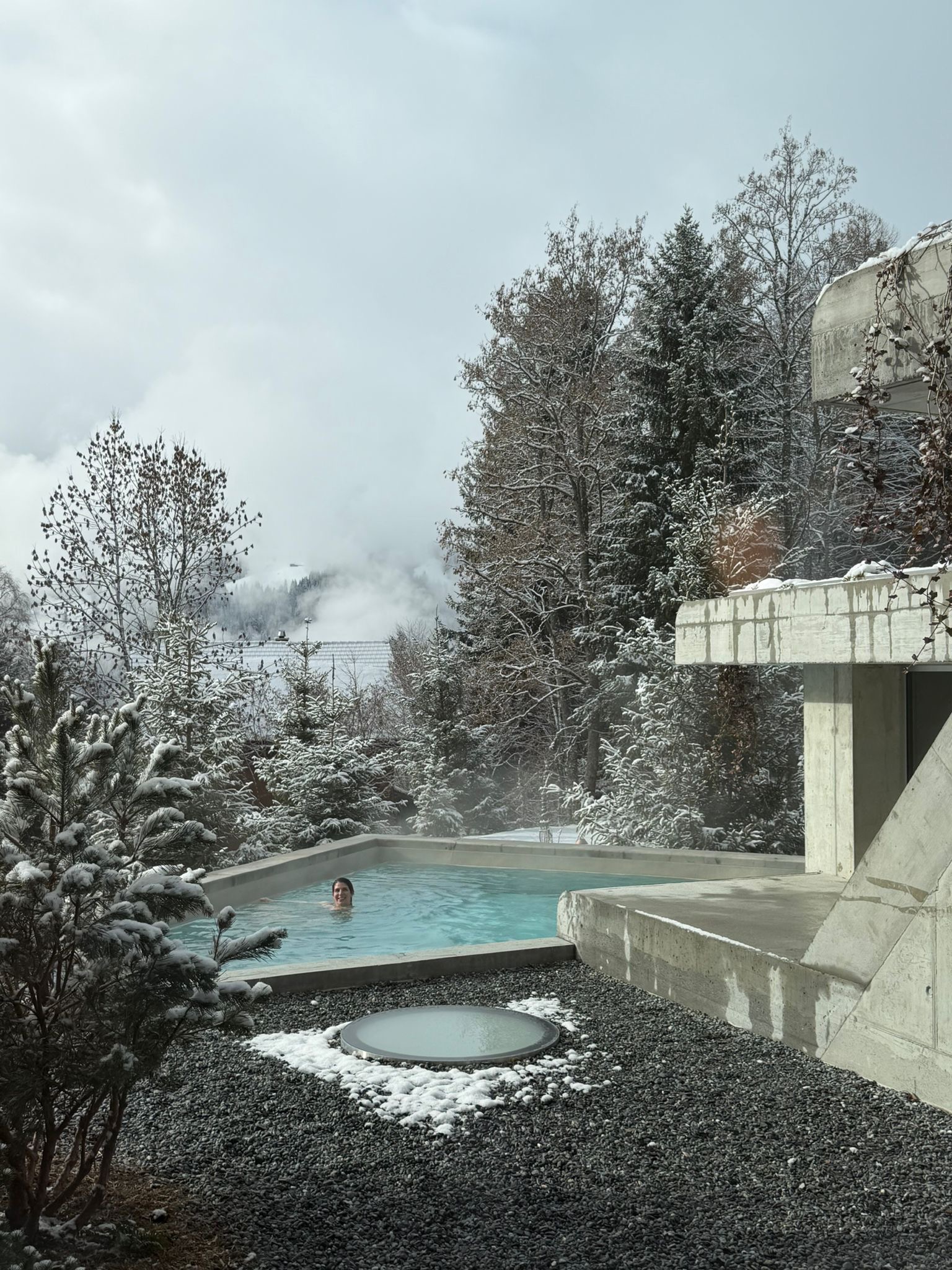 Outdoor heated pool in winter snow at Grand Hotel Belvedere, Wengen
