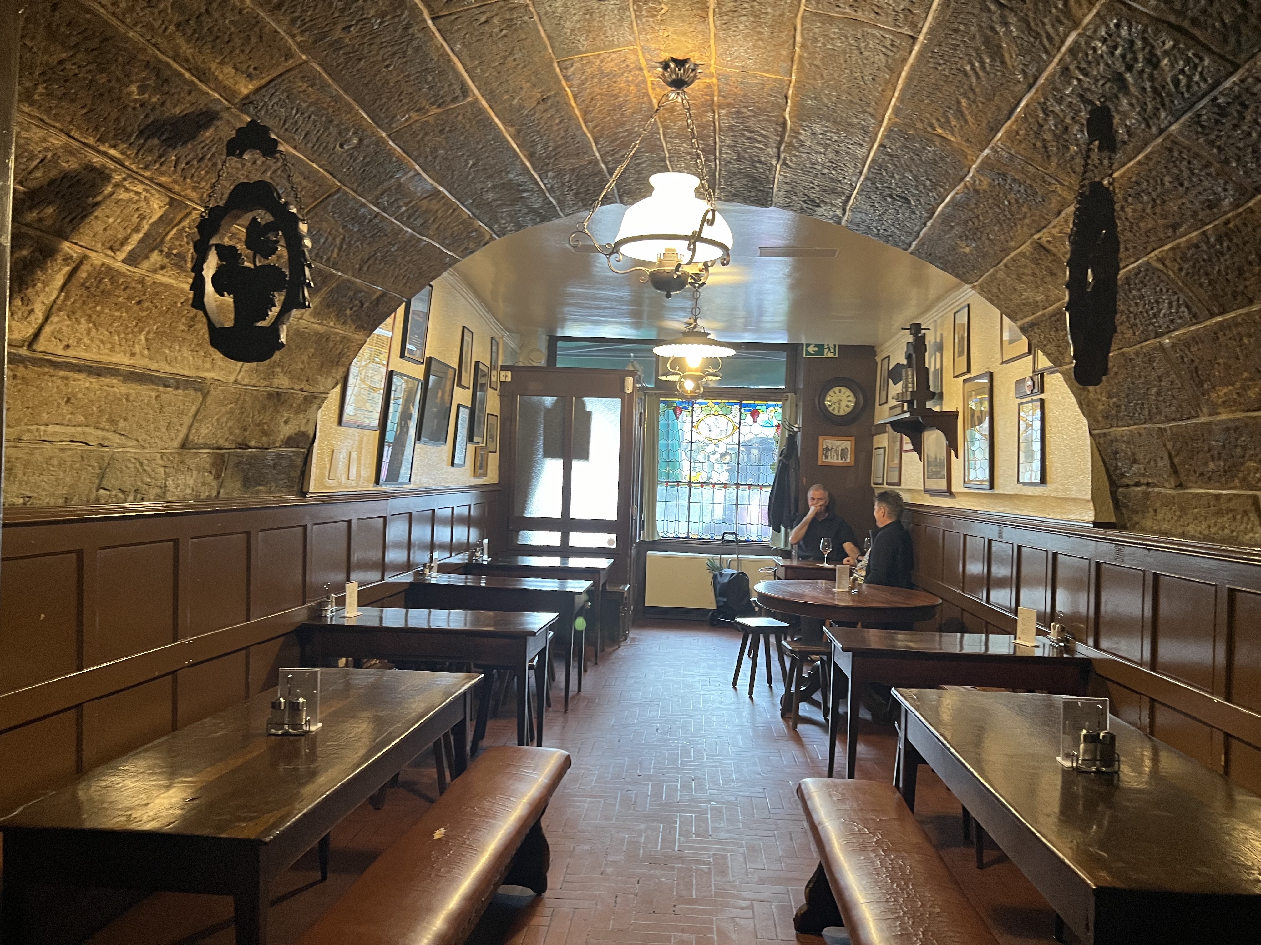 The vaulted stone interior of Pinte Besson, Lausanne